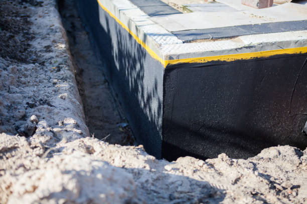 Professional Interior Drainage System technician working in Ionia, NY